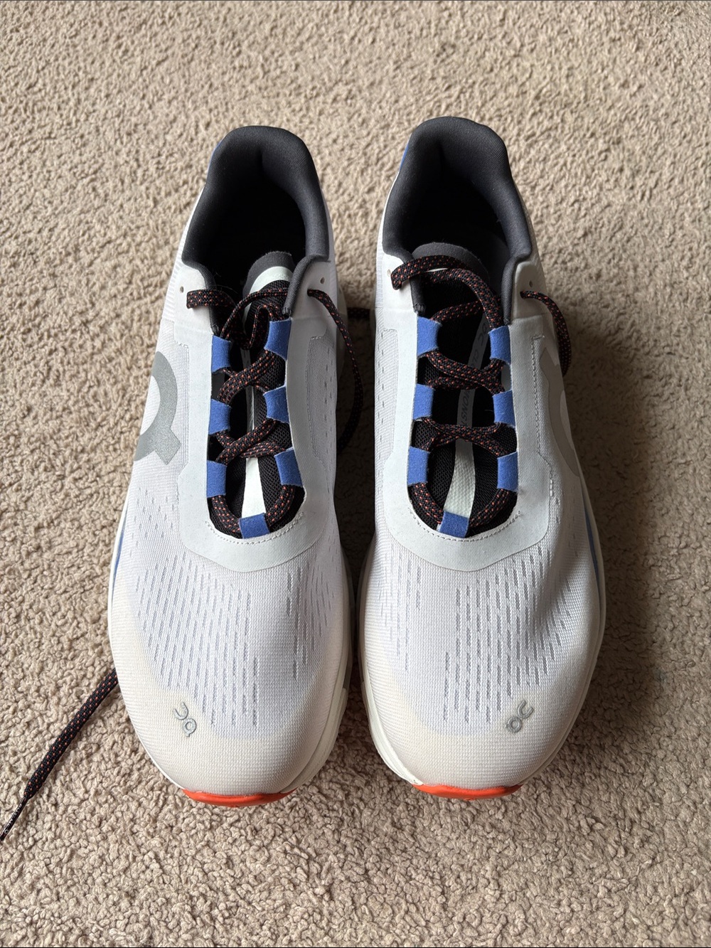 On Running Men's Sneakers in White with Blue and Orange Accents